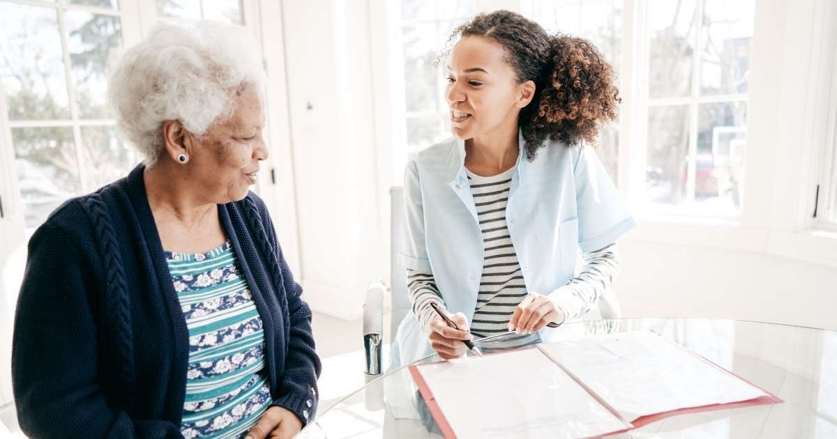 A woman and an older person are talking